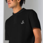 unisex pique polo shirt black zoomed in 647b4cee6738b